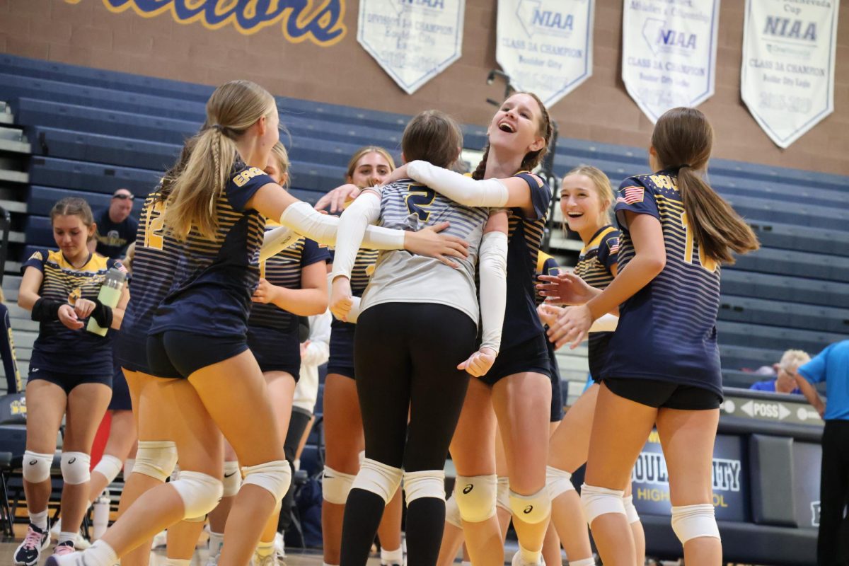 JV Volleyball celebrating a point.