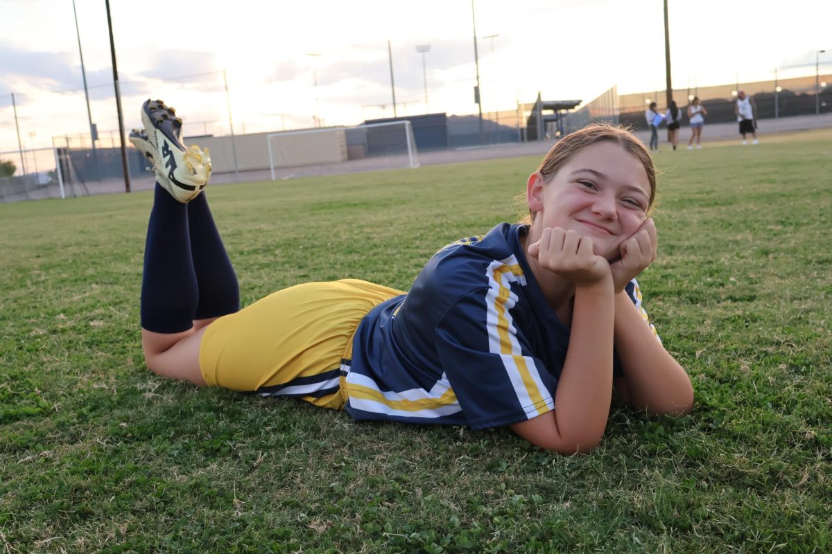 Kennedy Steckelberg posing after her soccer game. 