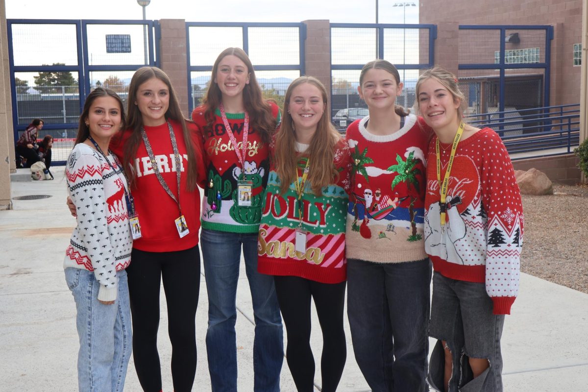 Sophomores posing with their Christmas Sweaters