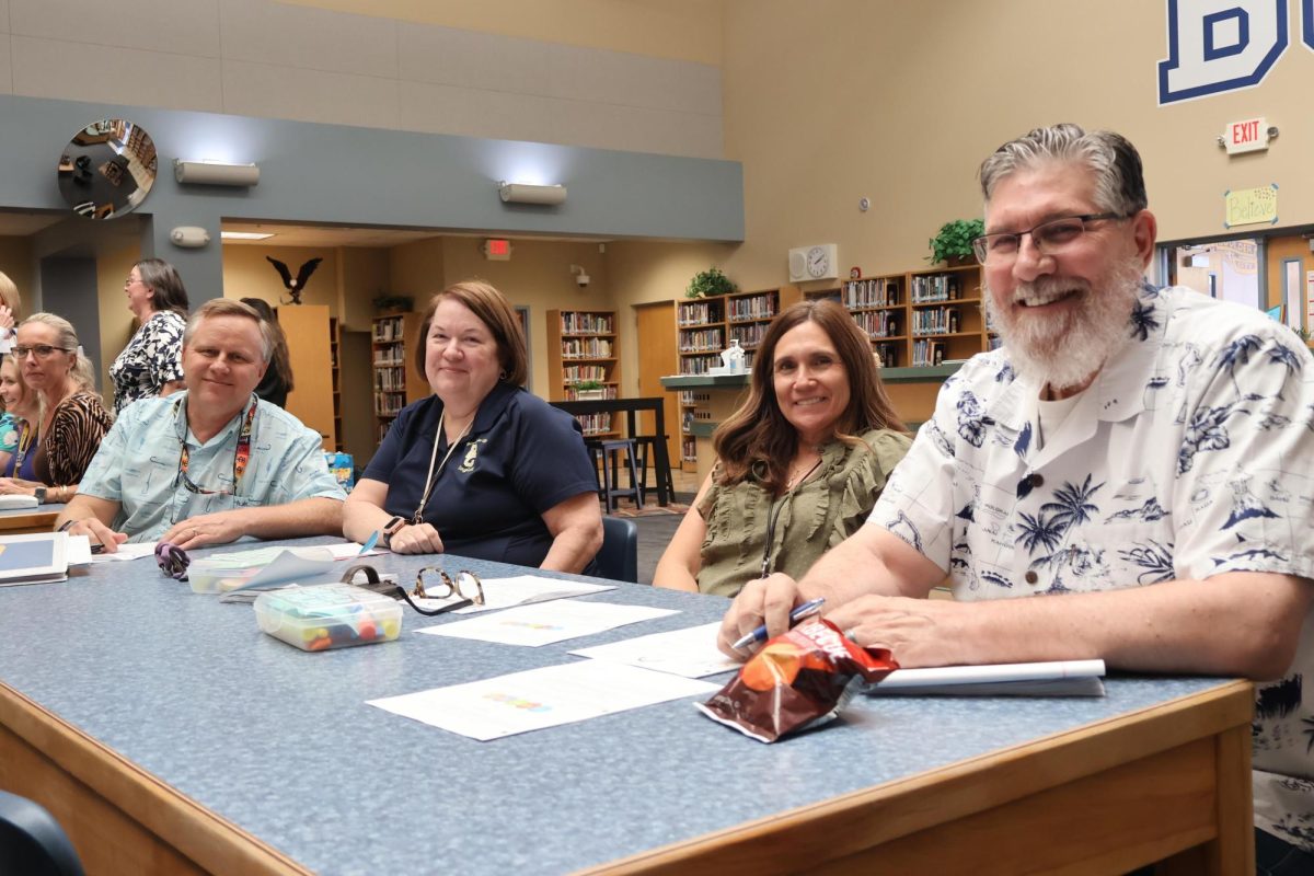 Mr. Strachan with other math teachers. 